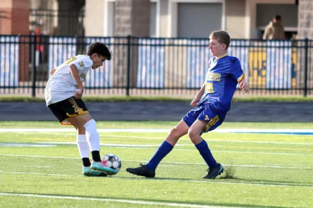 Kingsford downs Houghton, IM to extend win streak to four
